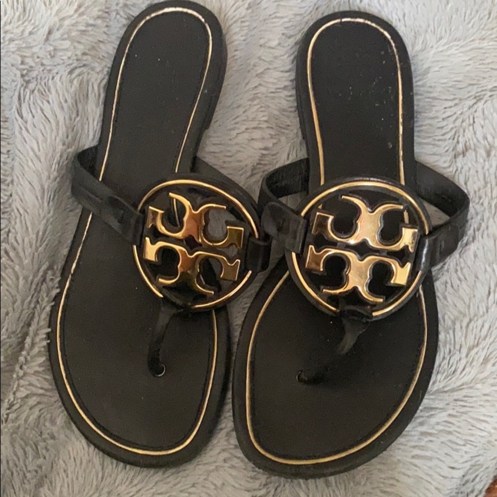 Tory Burch sandals with gold emblem